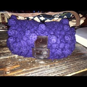 FENDI
Leather-Trimmed Purple knitted Pom Pom